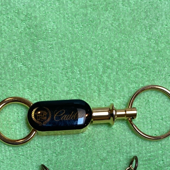 Six Cadillac Gold Tone Key Charms. - Picture 4 of 5